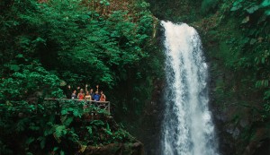 Travelers in Costa Rica enjoying the beautiful waterfalls